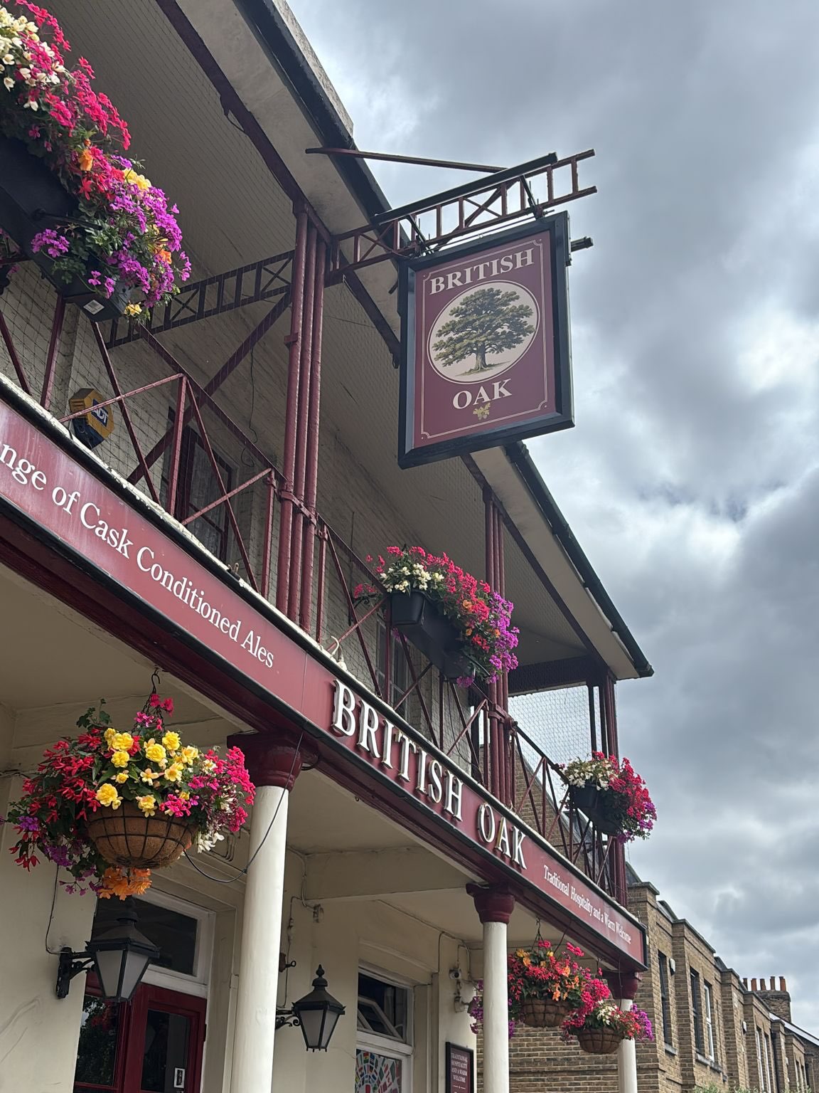 The British Oak traditional London and the UK pub fascia signage with 3D gold built-up lettering
